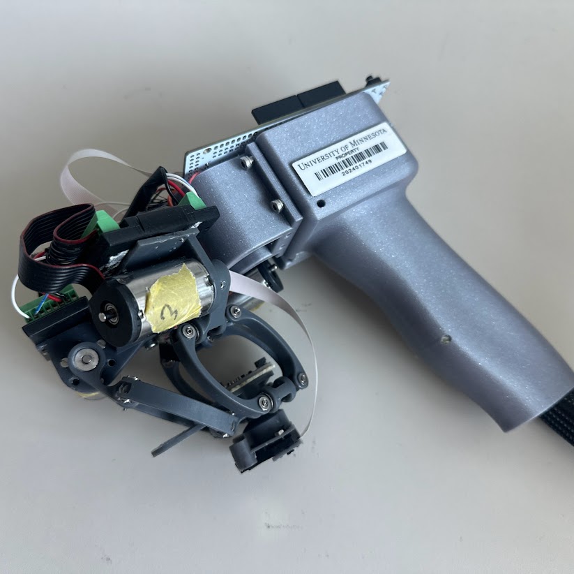 Handheld Delta Robot for Enhanced Motor Control